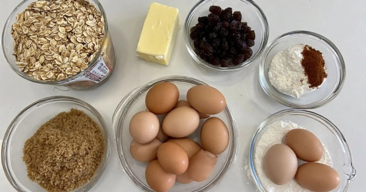 Essential ingredients for the perfect oatmeal raisin cookies recipe, featuring rolled oats and sweet raisins.
