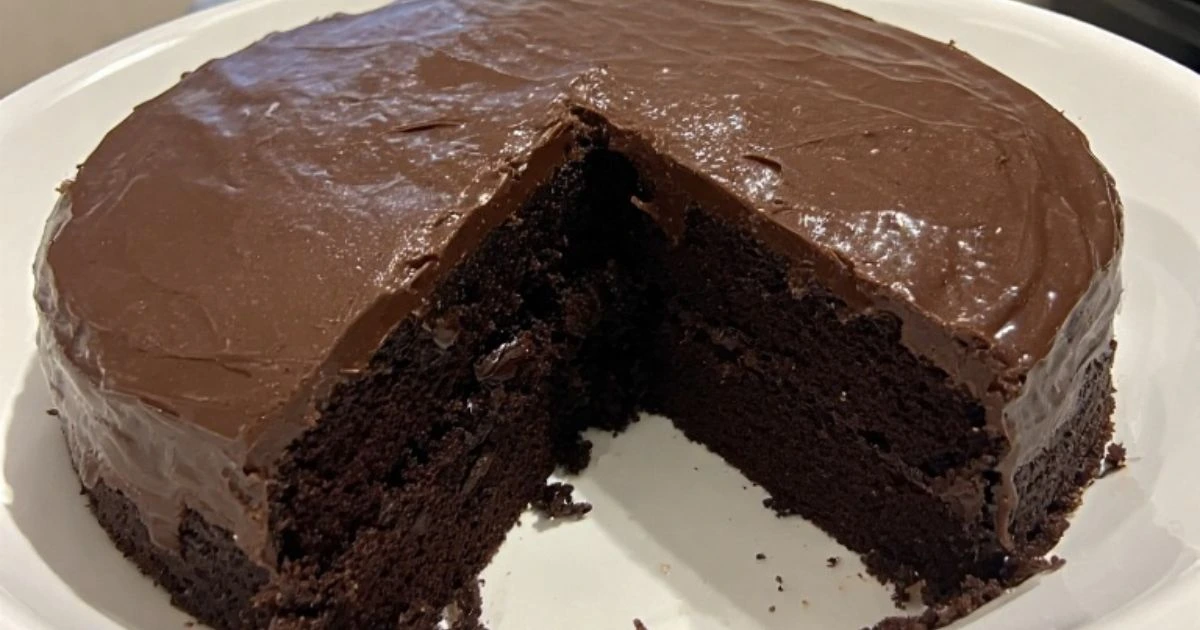 Delicious easy chocolate cake recipe, perfectly moist with a rich chocolate frosting.